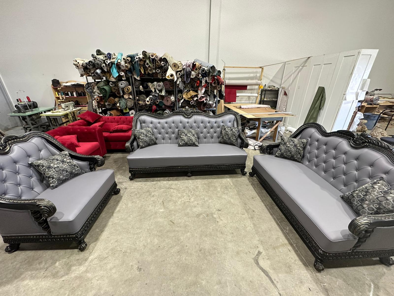 Luxury ornate living room set with button tufting